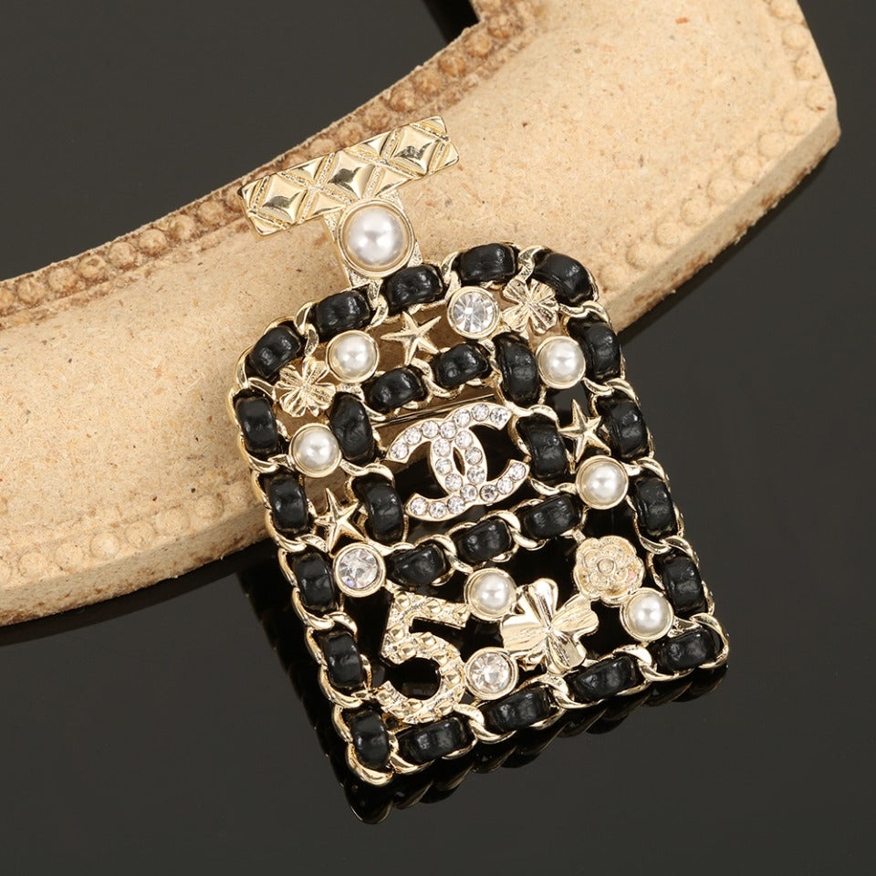 18K  Chanel Bottle Strass Brooch