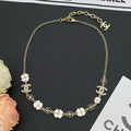 18K  Chanel Black & White Camellia Necklace