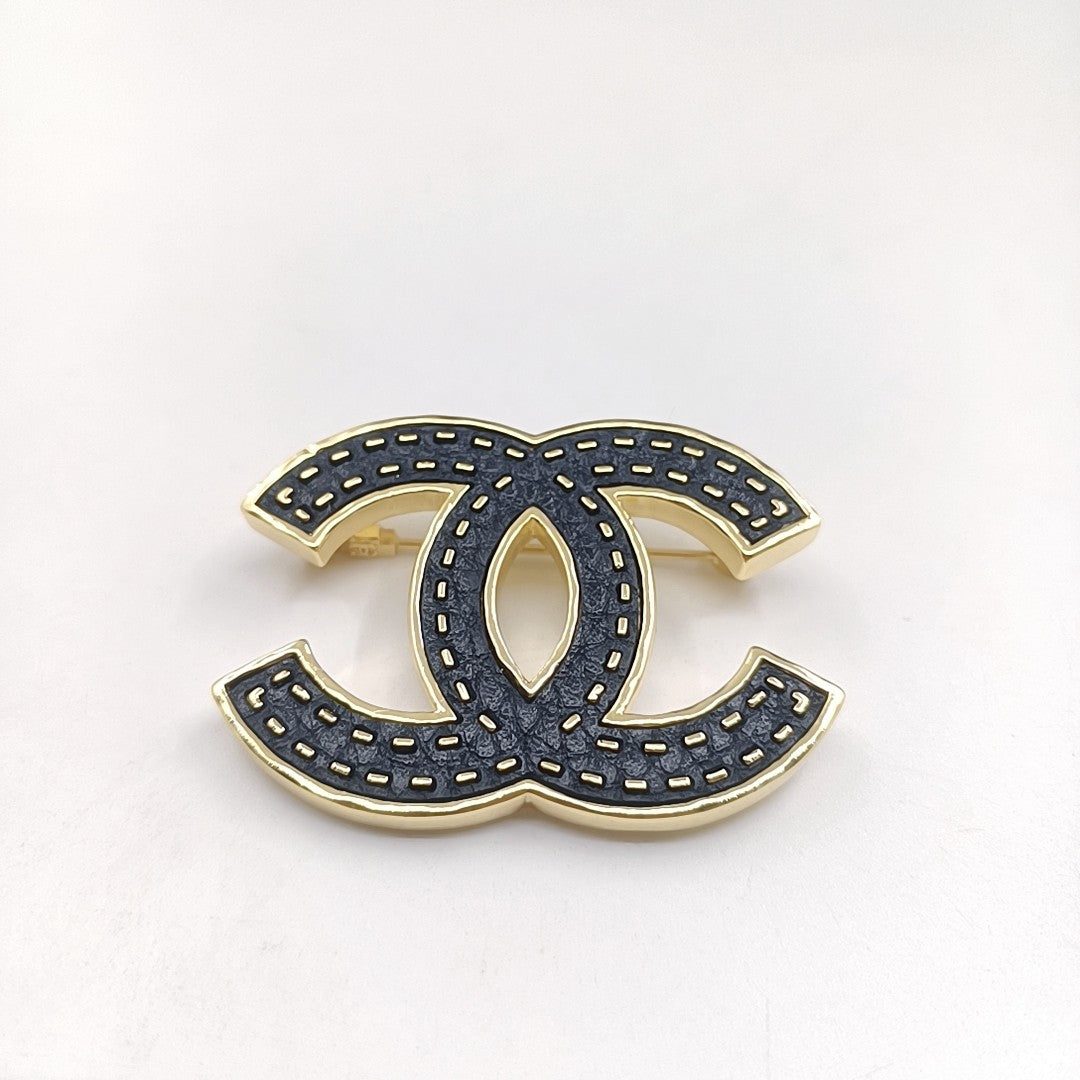 18K  Chanel Black Brooch