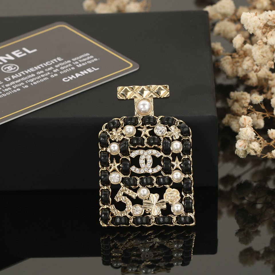 18K  Chanel Bottle Strass Brooch