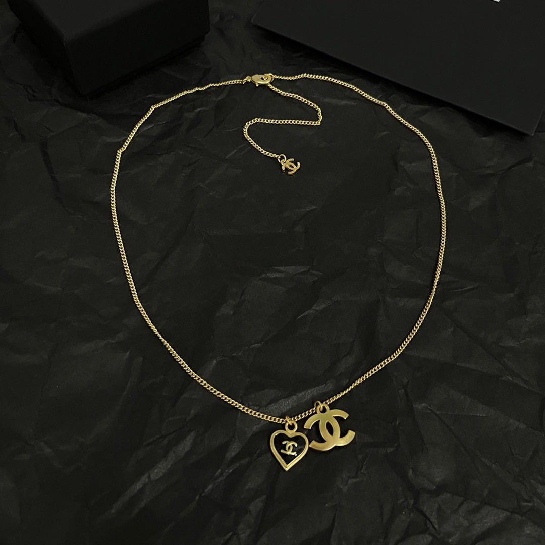 18K  Chanel Black Heart Necklace