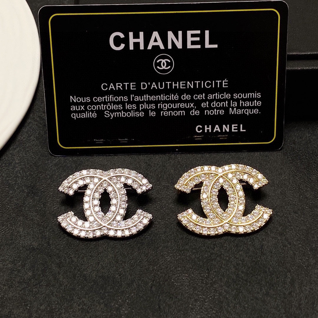 18K  Chanel Diamonds Set Broochs