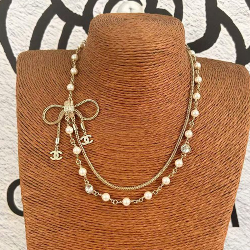 18K  Chanel Bow Tie Pearl Necklace