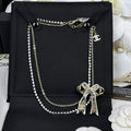 18K  Chanel 25K Bow Tie Diamond Gold Necklace
