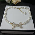 18K  Chanel Bow Pearl Necklace