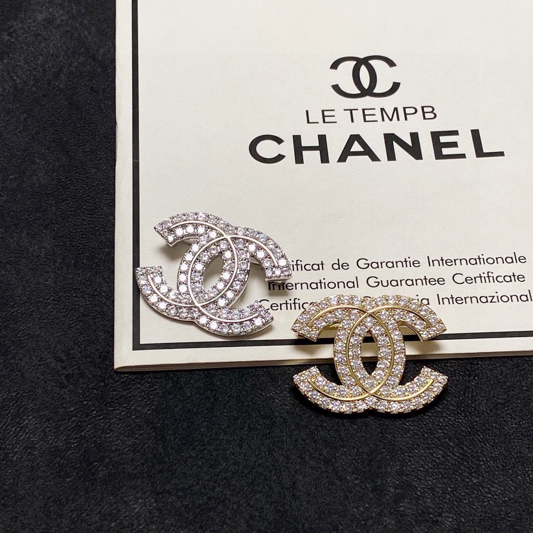 18K  Chanel Diamonds Set Broochs
