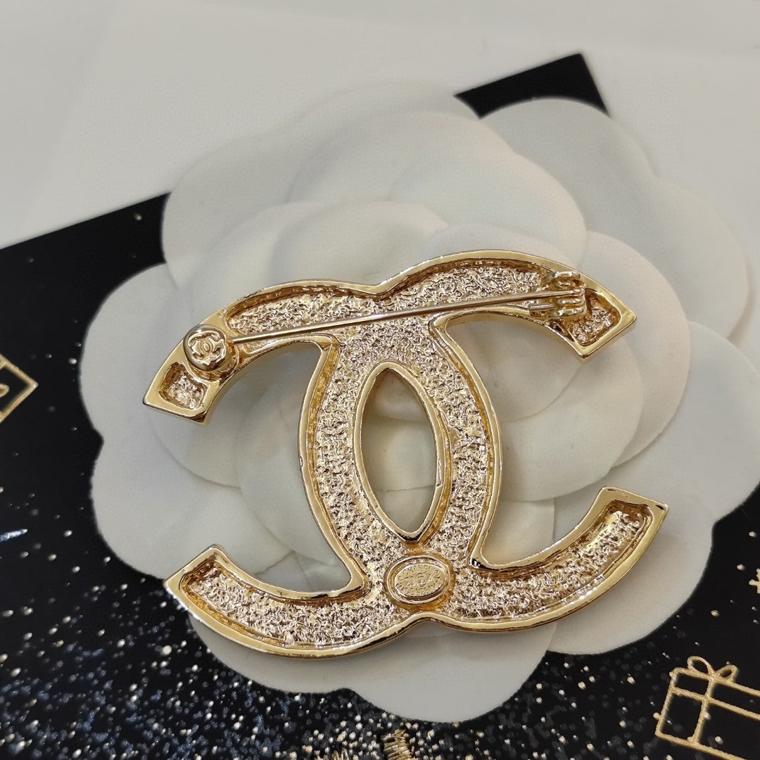 18K  Chanel Black Star Brooch