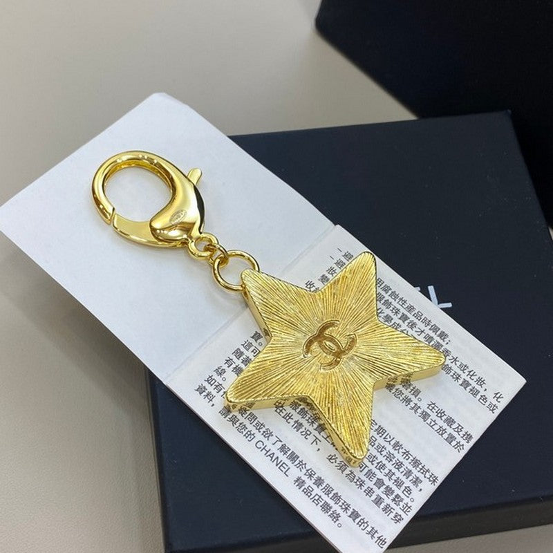 18K  Chanel Black Gold Star Brooch