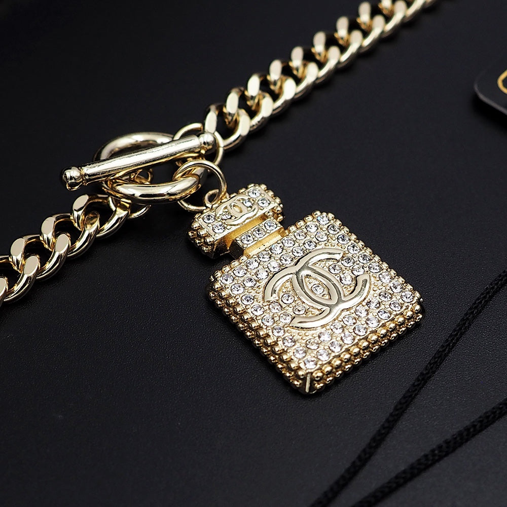 18K  Chanel Diamond Perfume Bottle Pendant Necklace